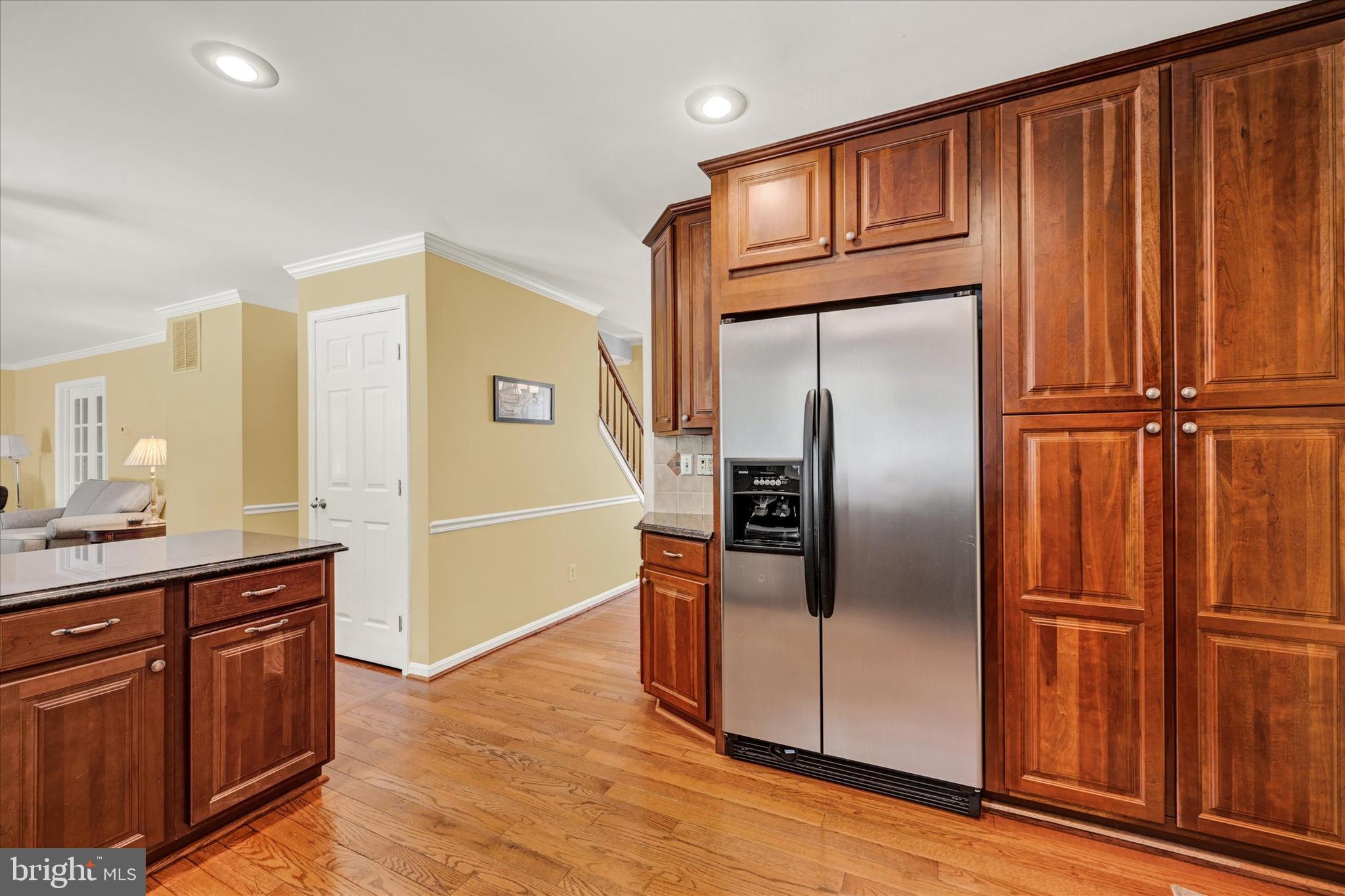 9006 Naygall Road Baltimore, MD 21234 - Photo 9 of 34 a kitchen with granite countertop a refrigerator and a sink