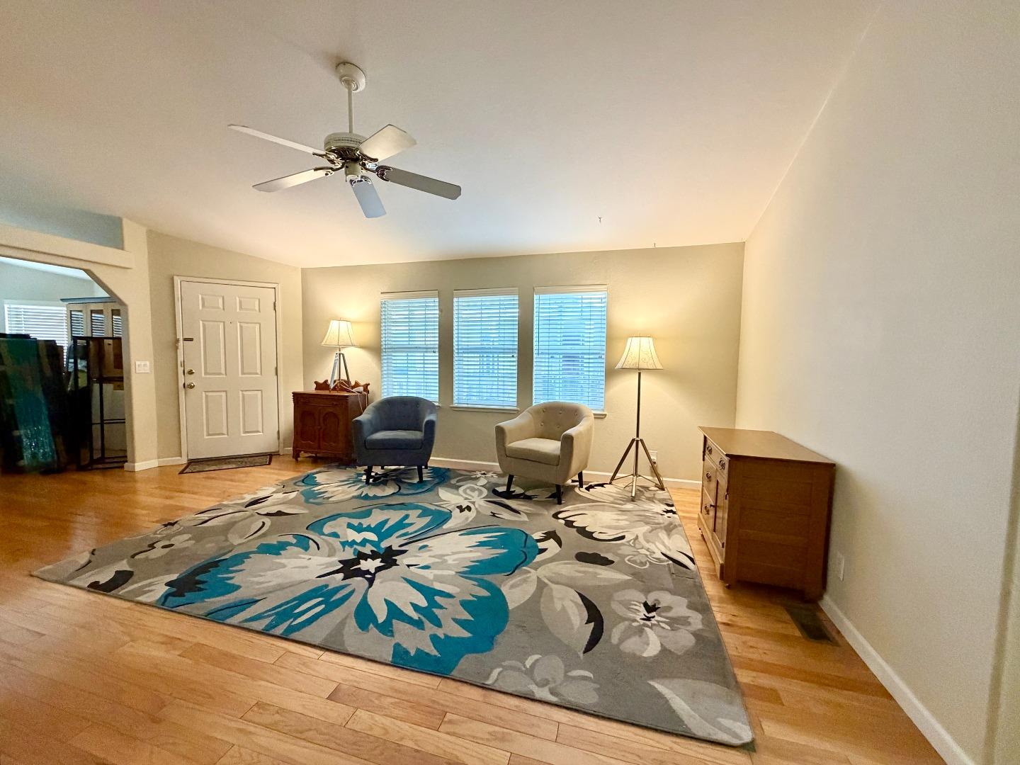 120 Dixon Landing Road, Unit 147 Milpitas, CA 95035 - Photo 5 of 21 a living room with furniture and a wooden floor