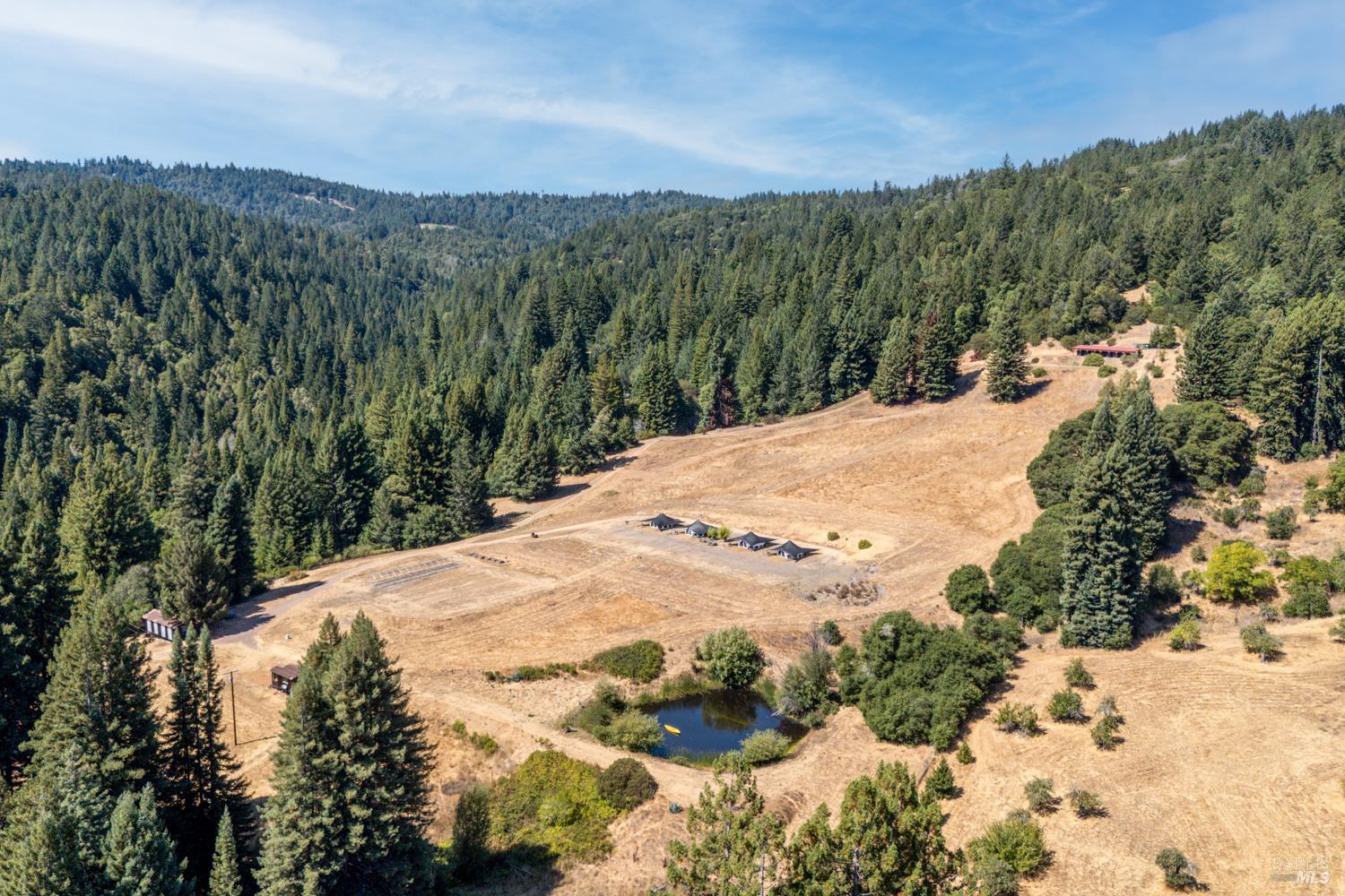 a view of a backyard of a house