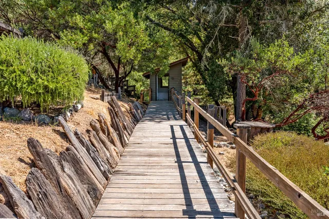 a view of balcony and yard