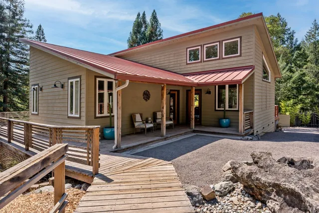 a front view of a house with patio