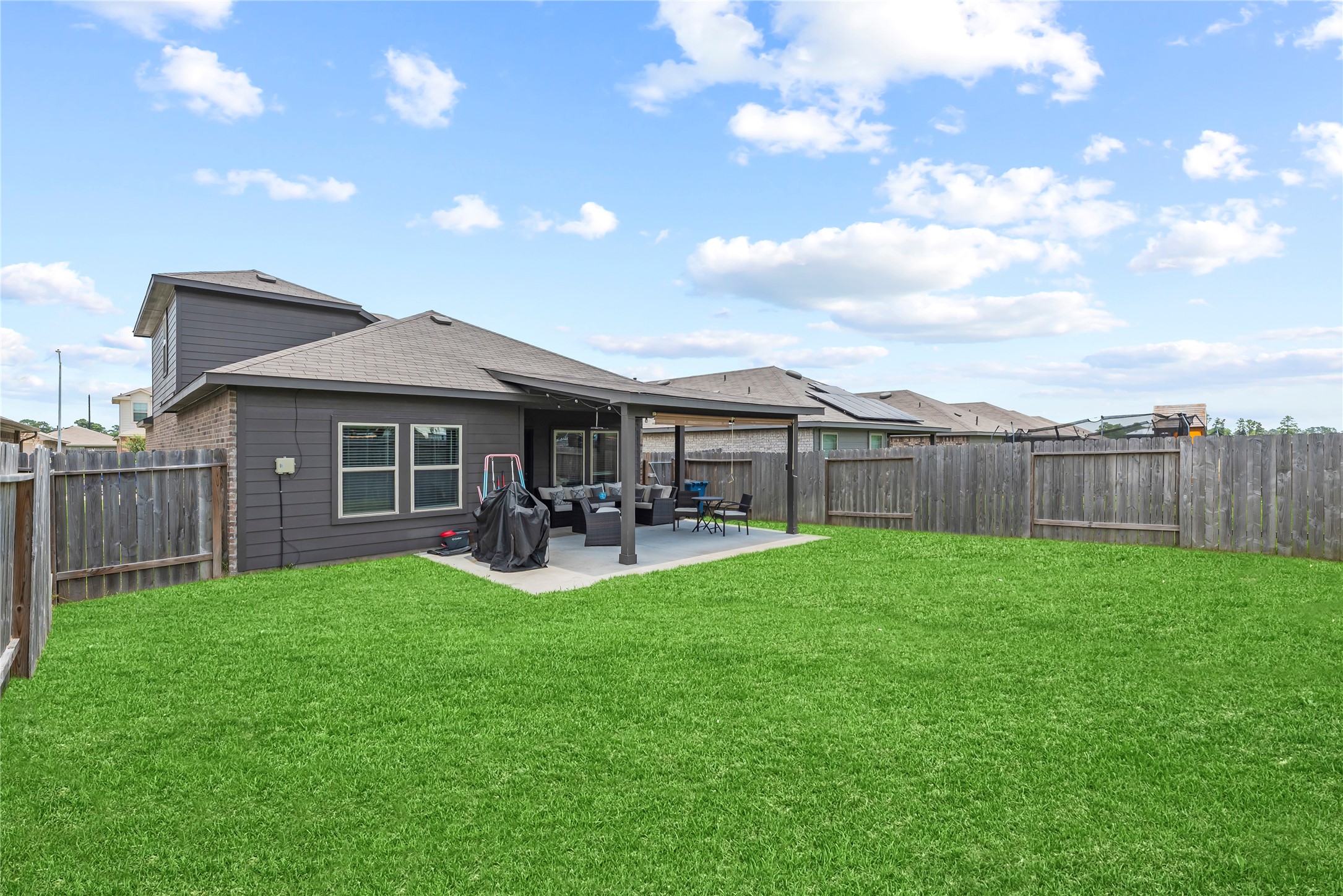 22603 Aspen Tarn Trail Spring, TX 77373 - Photo 16 of 21 a view of a house with backyard and sitting area