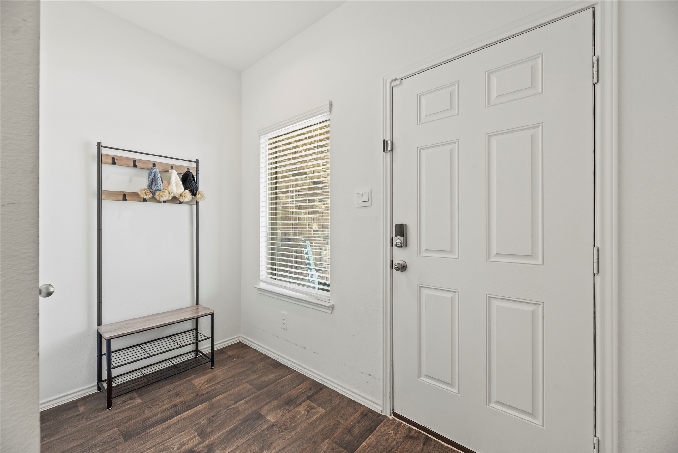 22603 Aspen Tarn Trail Spring, TX 77373 - Photo 17 of 21 a view of an empty room with wooden floor and a window