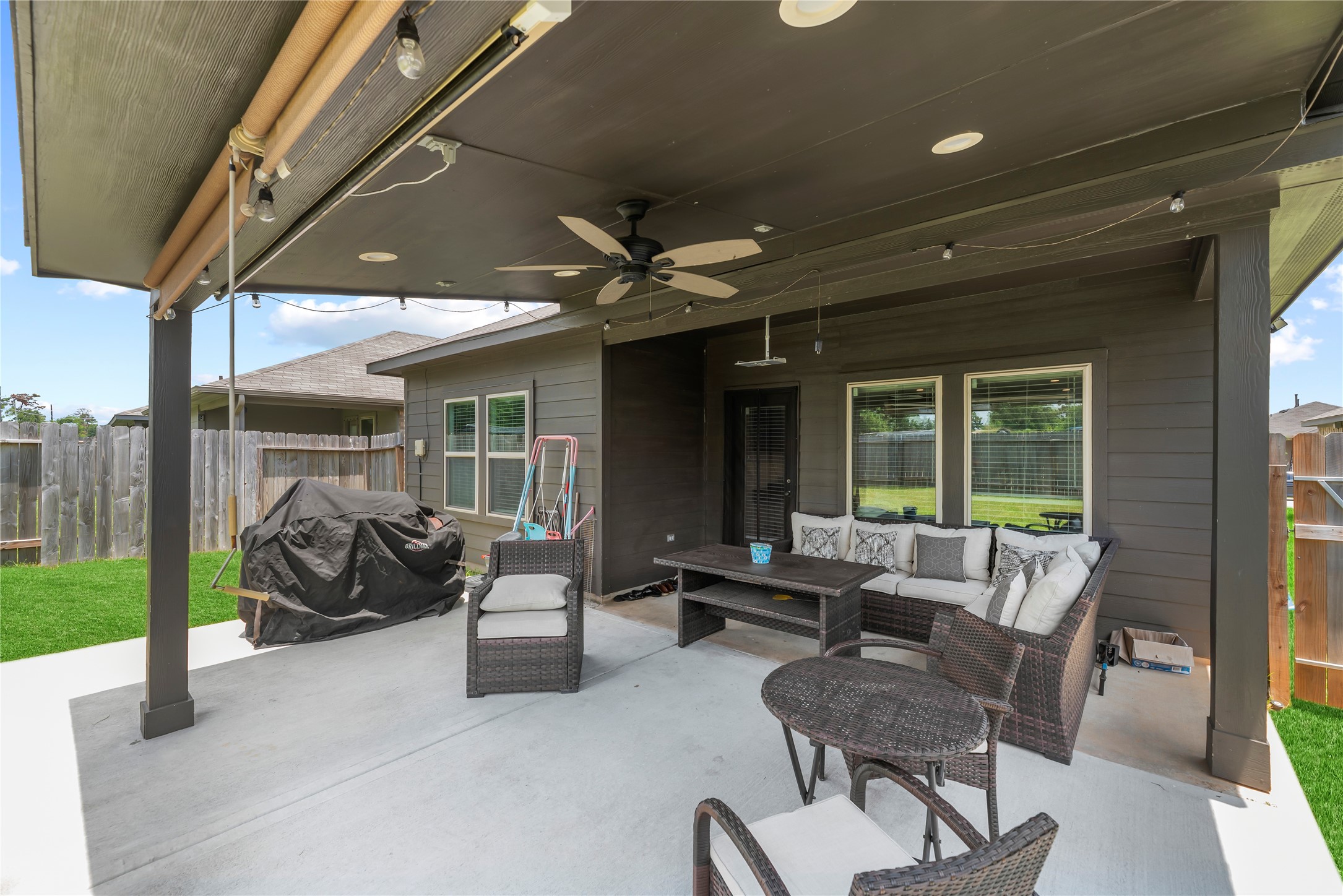 22603 Aspen Tarn Trail Spring, TX 77373 - Photo 18 of 21 a building outdoor space with patio furniture and garden