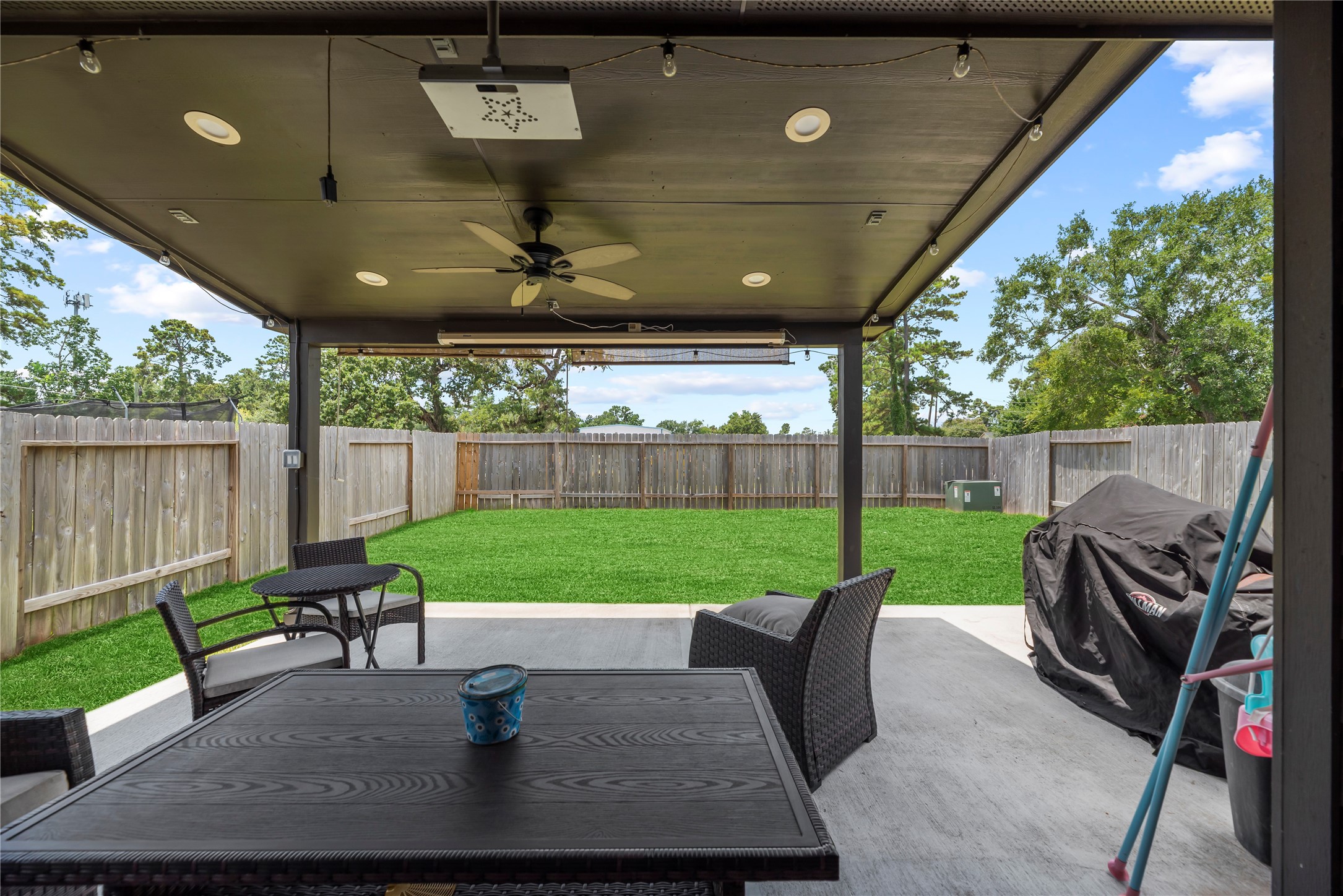 22603 Aspen Tarn Trail Spring, TX 77373 - Photo 19 of 21 a view of a couches in patio and a yard