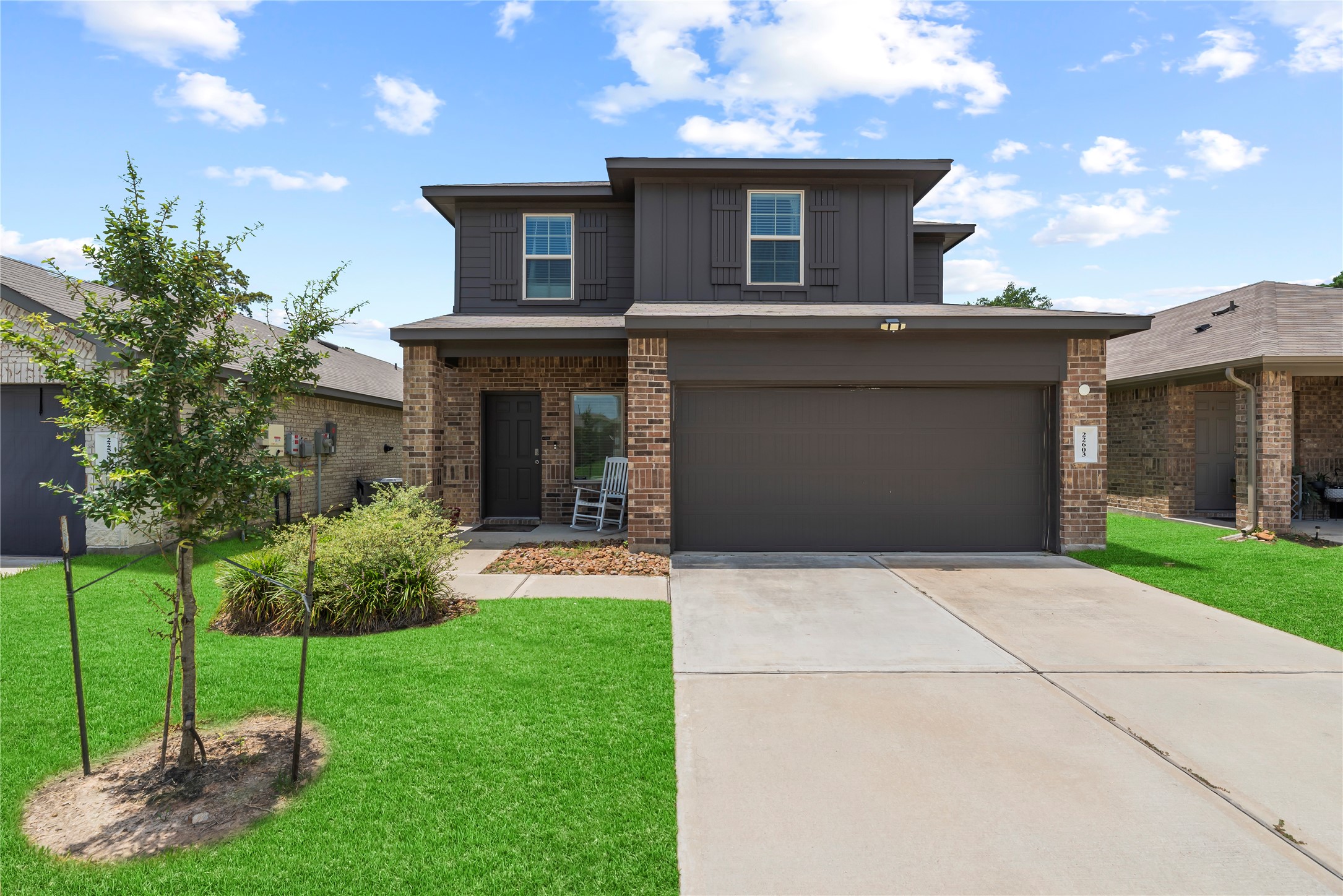 22603 Aspen Tarn Trail Spring, TX 77373 - Photo 20 of 21 a front view of a house with a yard and garage