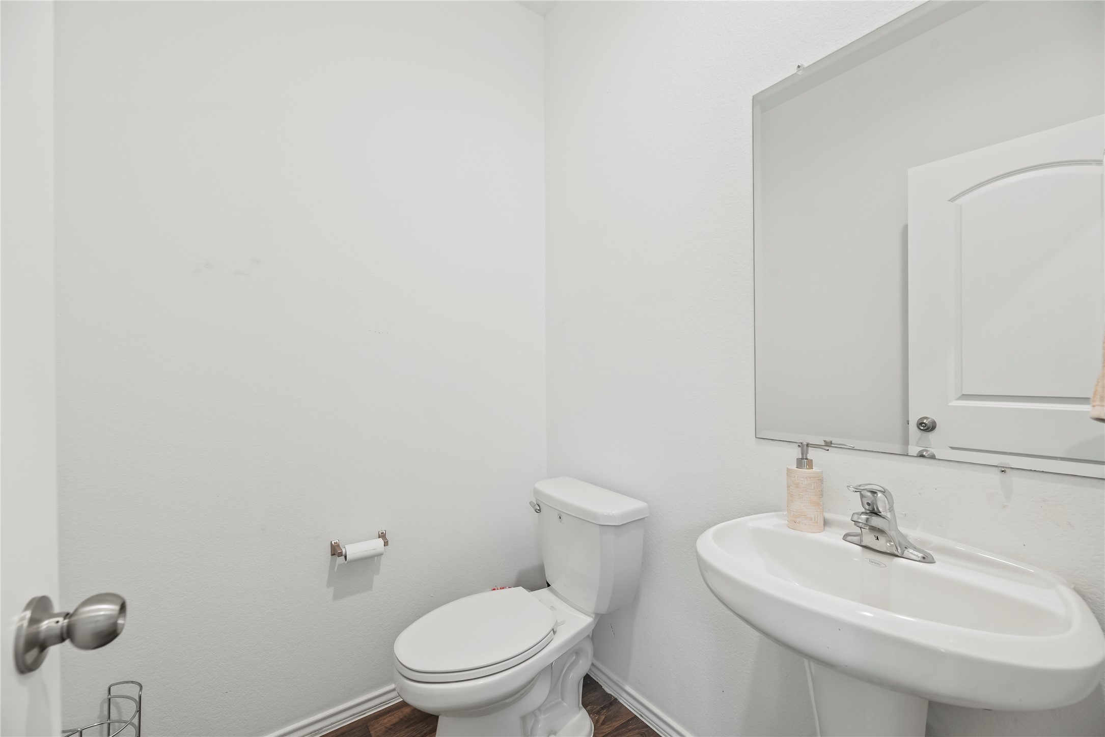 22603 Aspen Tarn Trail Spring, TX 77373 - Photo 10 of 21 a bathroom with a sink a toilet and mirror