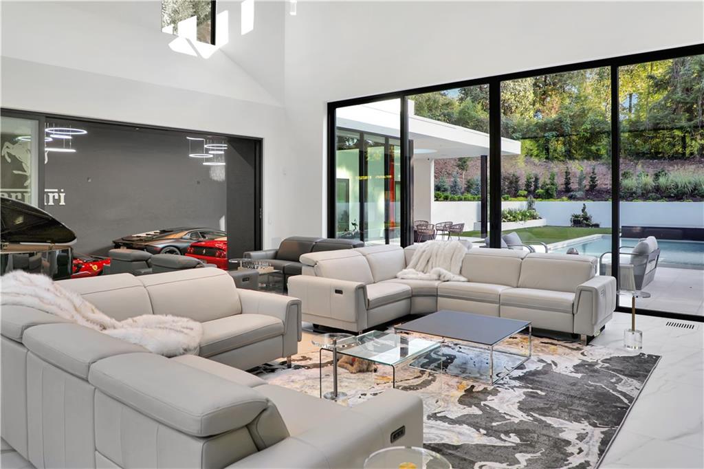 380 West Wesley Road Northwest Atlanta, GA 30305 - Photo 26 of 104 a living room with furniture and a large window