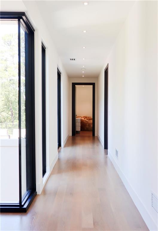 380 West Wesley Road Northwest Atlanta, GA 30305 - Photo 47 of 104 a view of a hallway with a closet and a window