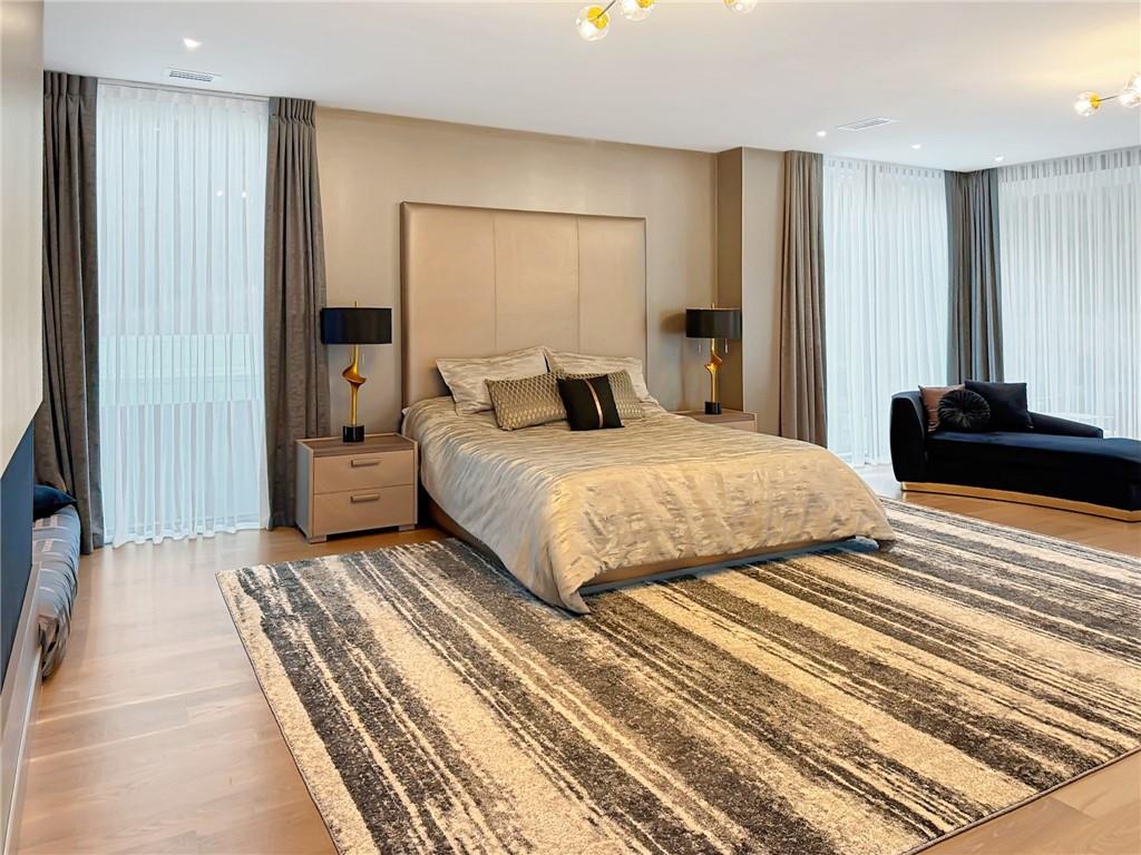 380 West Wesley Road Northwest Atlanta, GA 30305 - Photo 52 of 104 a bedroom with a bed and a walk in closet