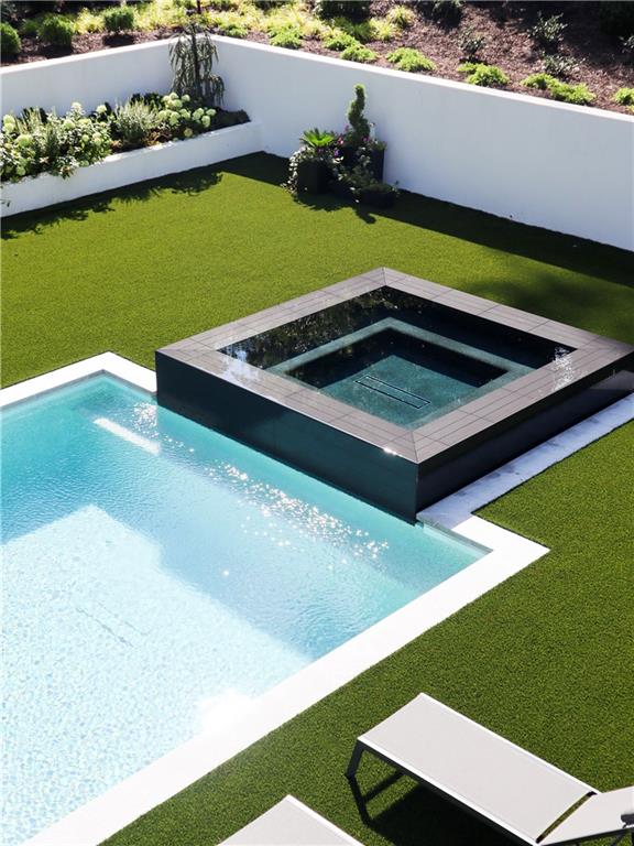 380 West Wesley Road Northwest Atlanta, GA 30305 - Photo 6 of 104 a view of a pool an outdoor space and seating area