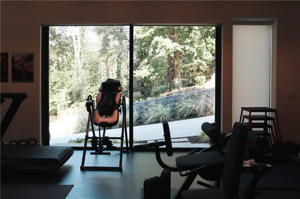 380 West Wesley Road Northwest Atlanta, GA 30305 - Photo 67 of 104 a living room with furniture and a large window