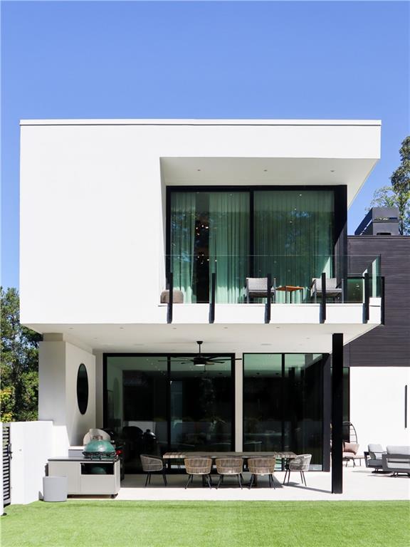380 West Wesley Road Northwest Atlanta, GA 30305 - Photo 7 of 104 a view of house and outdoor space with seating area