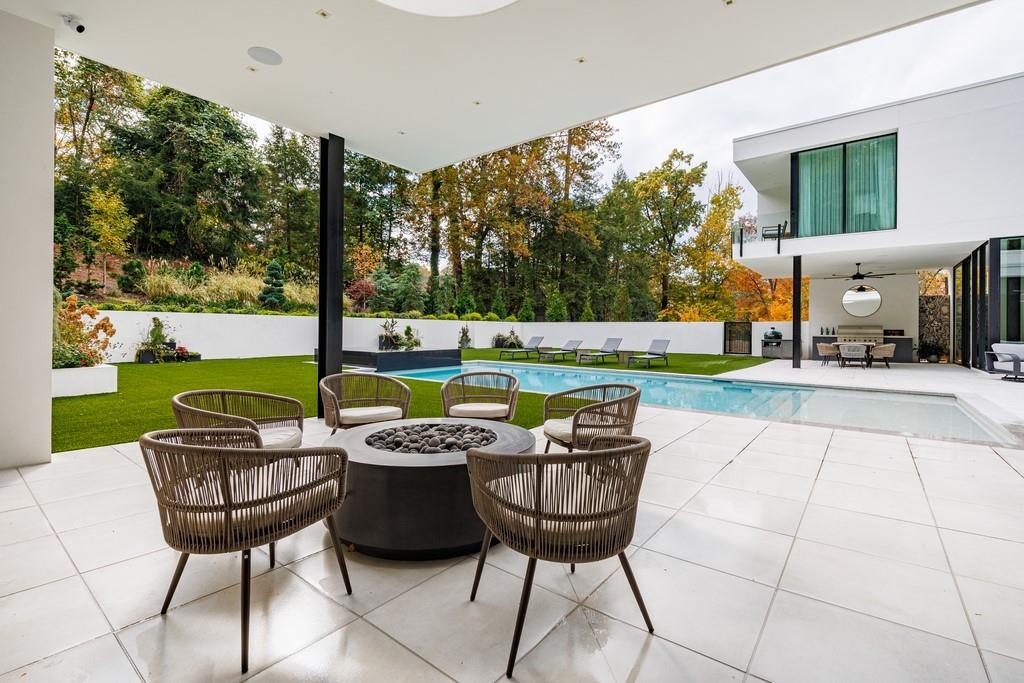 380 West Wesley Road Northwest Atlanta, GA 30305 - Photo 73 of 104 a view of a yard with furniture and garden