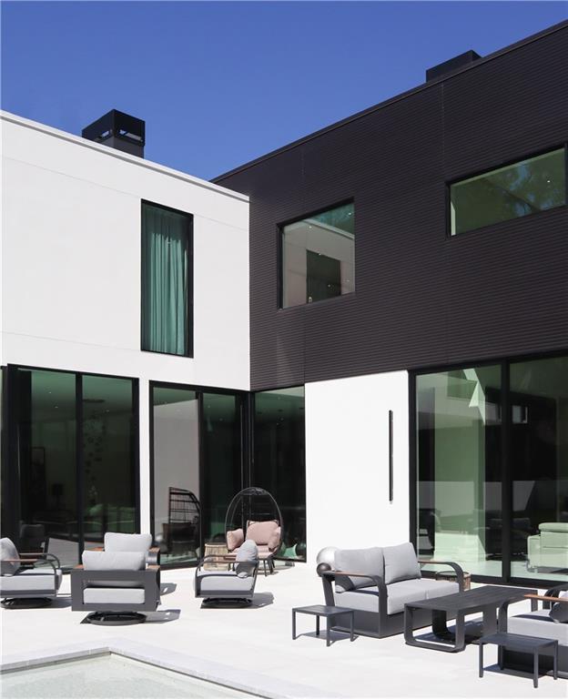 380 West Wesley Road Northwest Atlanta, GA 30305 - Photo 83 of 104 a building outdoor space with patio furniture and potted plants