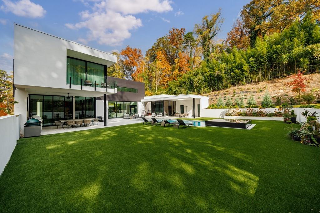380 West Wesley Road Northwest Atlanta, GA 30305 - Photo 96 of 104 a front view of house with yard and seating area
