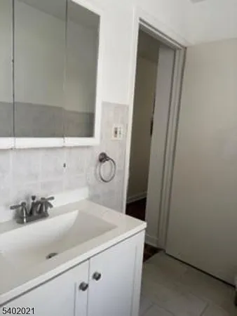 a bathroom with a sink and a toilet