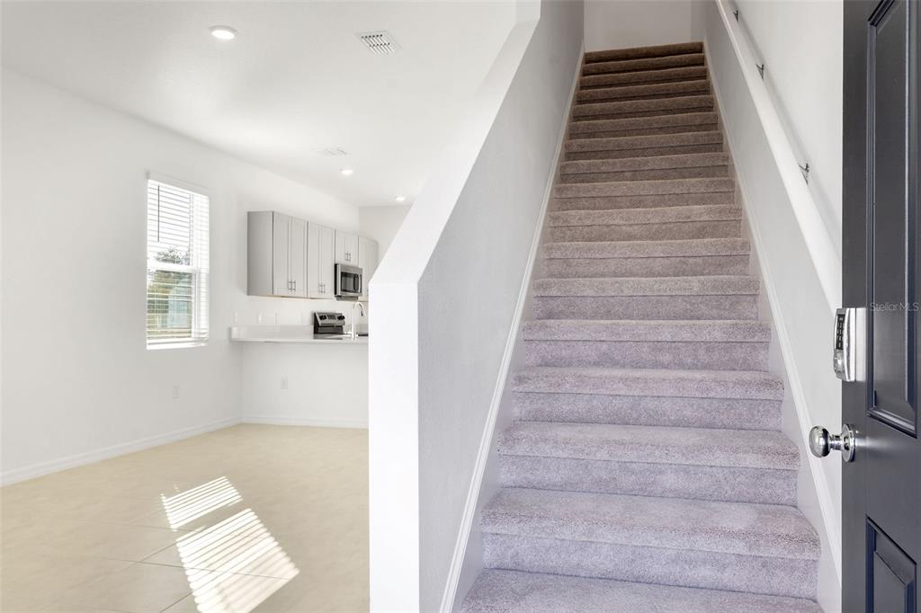 2987 Skyline Loop Kissimmee, FL 34758 - Photo 2 of 48 a view of entryway and hall