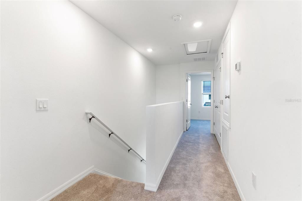 2987 Skyline Loop Kissimmee, FL 34758 - Photo 21 of 48 a view of a hallway with an entryway