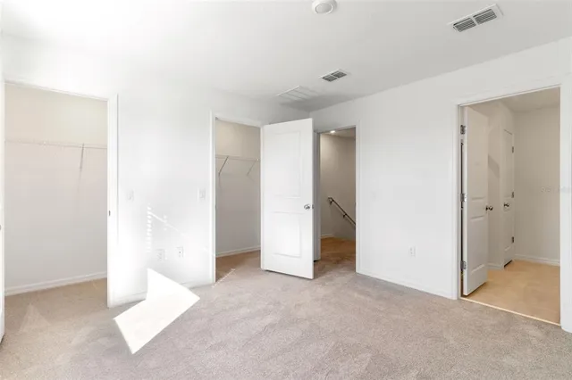 a view of a room with racks on the wall