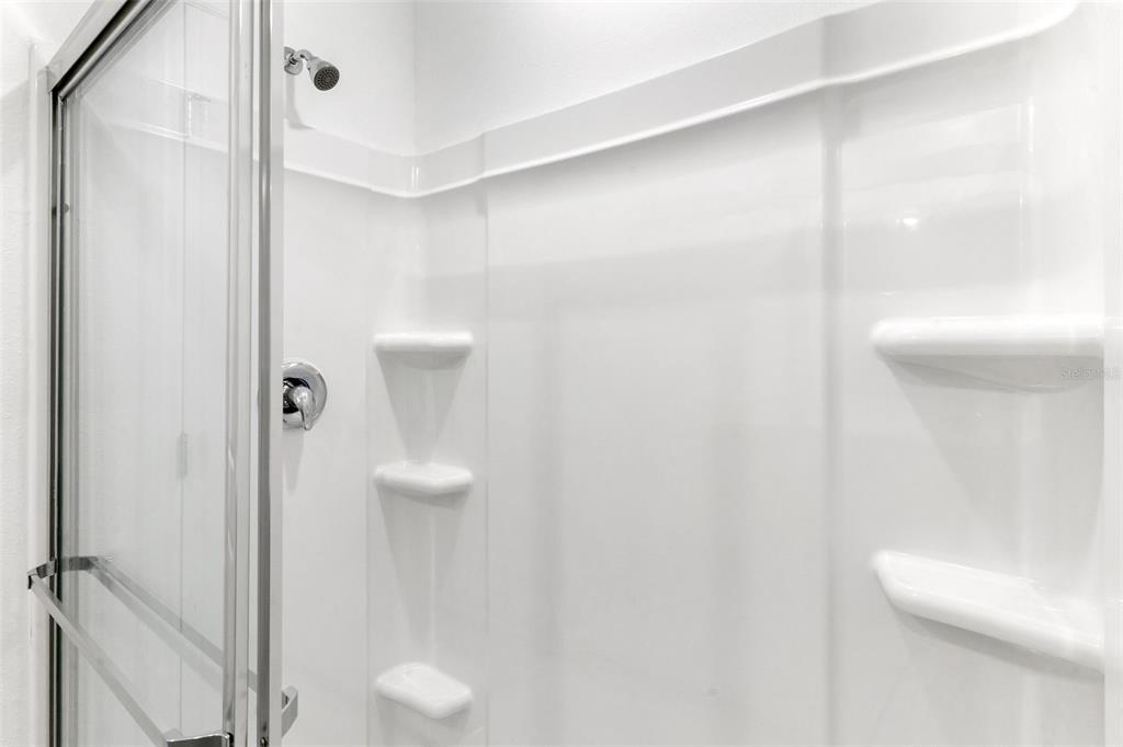 2987 Skyline Loop Kissimmee, FL 34758 - Photo 29 of 48 a bathroom with a shower