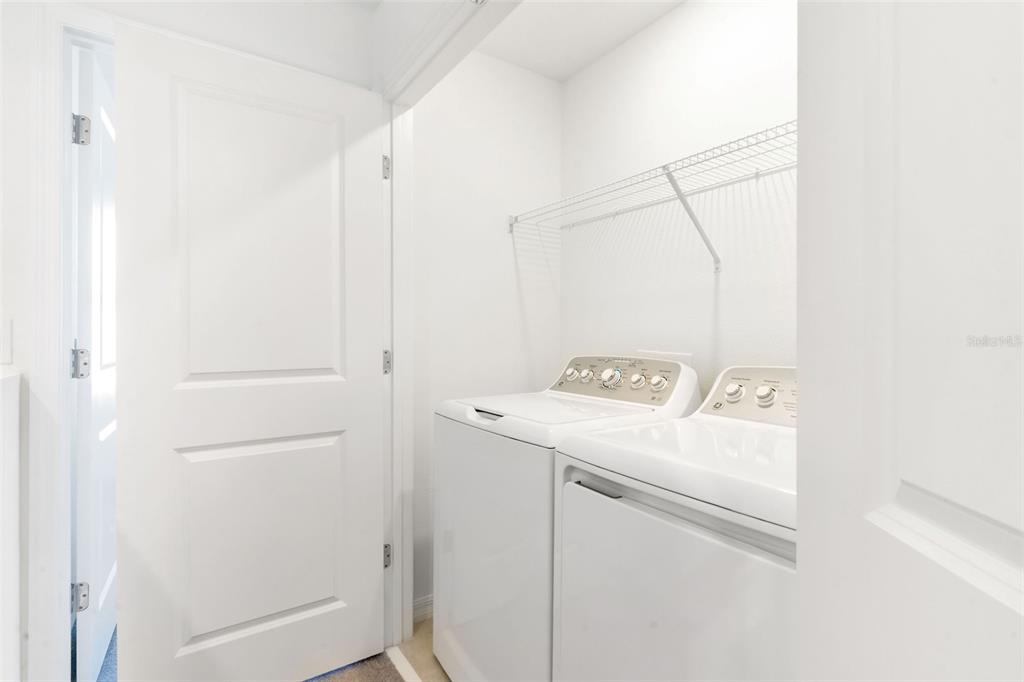 2987 Skyline Loop Kissimmee, FL 34758 - Photo 32 of 48 a utility room with dryer and washer