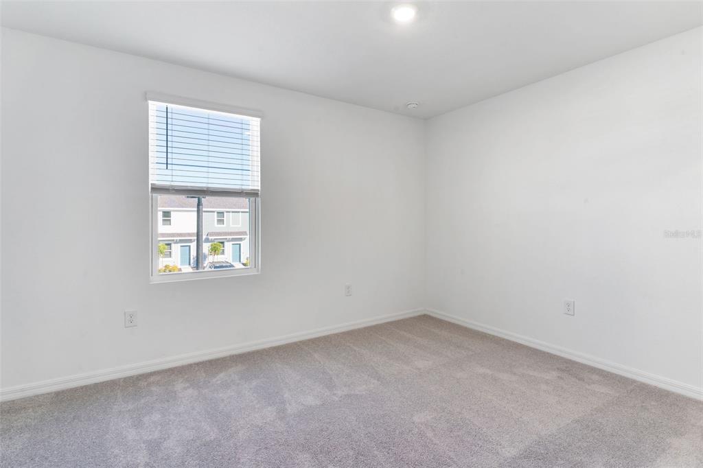 2987 Skyline Loop Kissimmee, FL 34758 - Photo 33 of 48 an empty room with a window