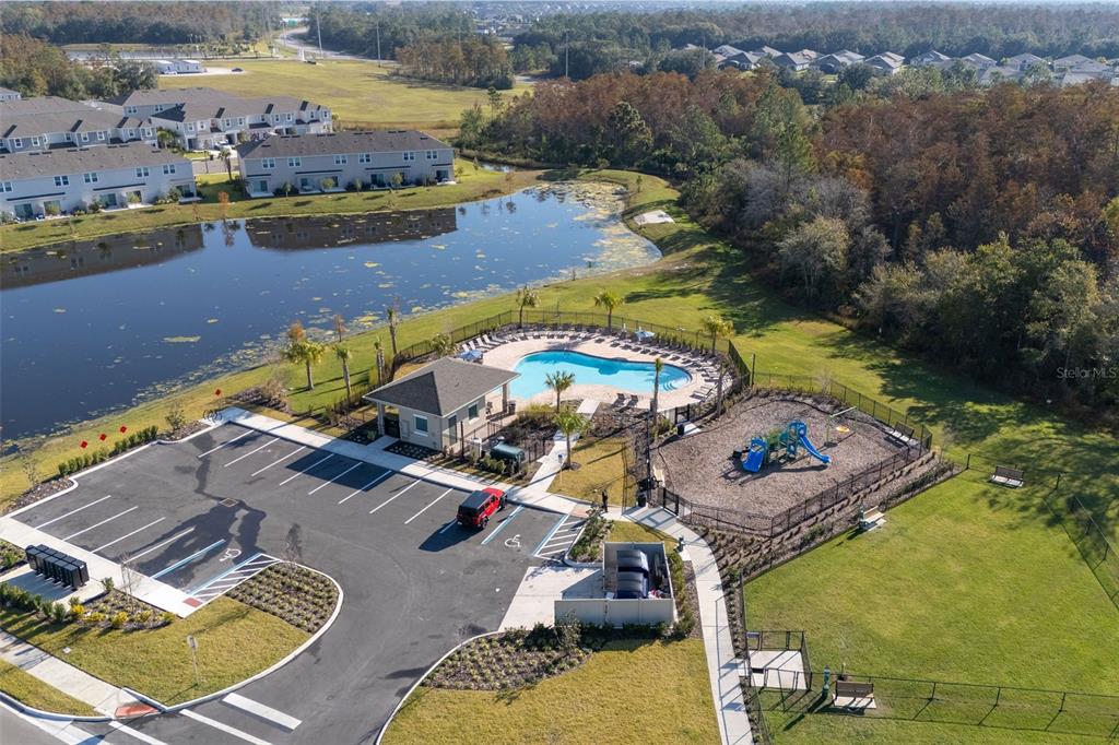 2987 Skyline Loop Kissimmee, FL 34758 - Photo 43 of 48 an aerial view of a swimming pool patio and mountain view