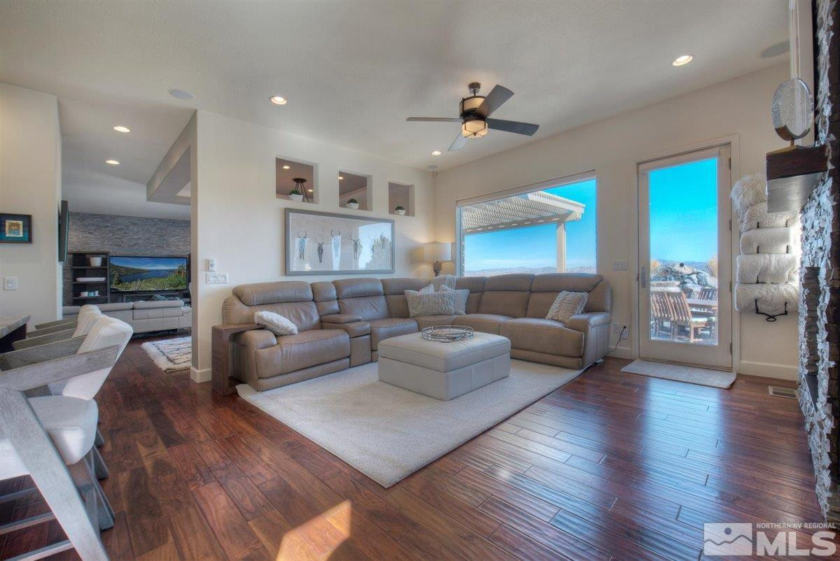 544 Echo Ridge Court Reno, NV 89511 - Photo 5 of 39 a living room with furniture and a wooden floor