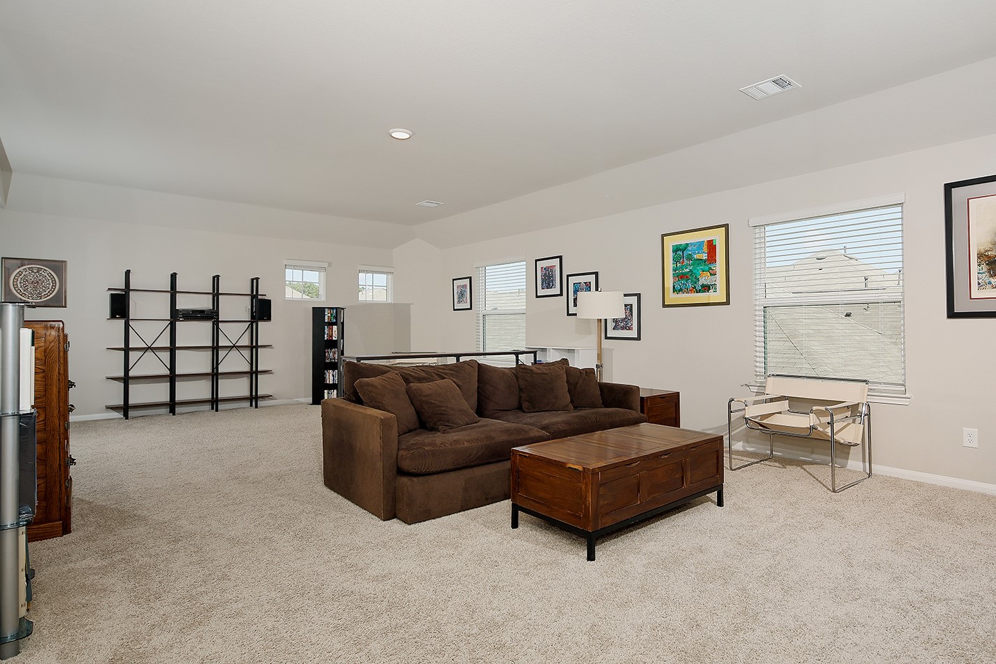 14022 Chinook Drive Conroe, TX 77384 - Photo 18 of 25 a living room with furniture and a couch