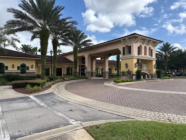 a living room with fireplace furniture and a fireplace