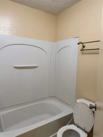 a bathroom with a sink and toilet