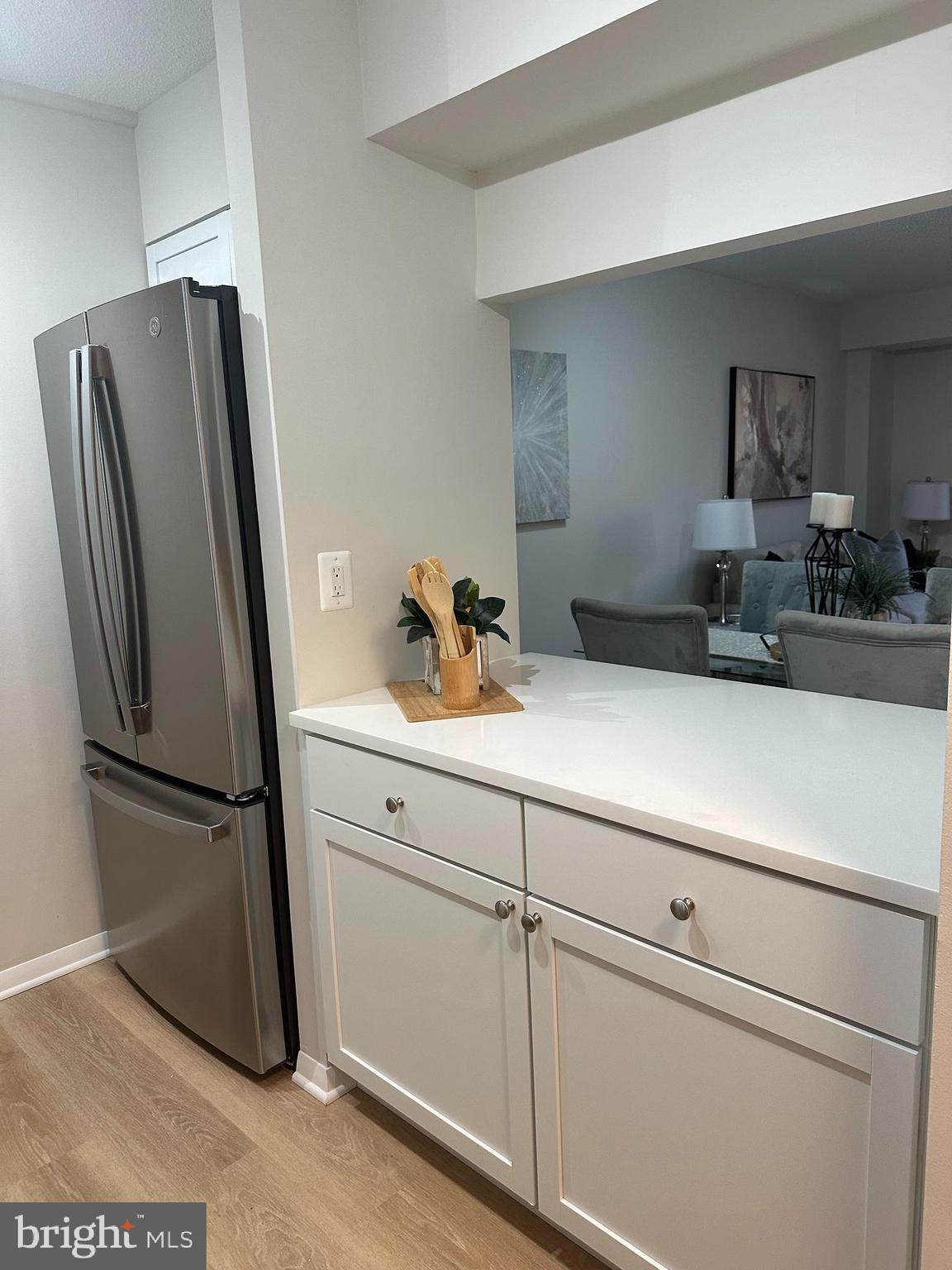 1808 Old Meadow Road, Unit 802 McLean, VA 22102 - Photo 4 of 33 open pass through to dining area