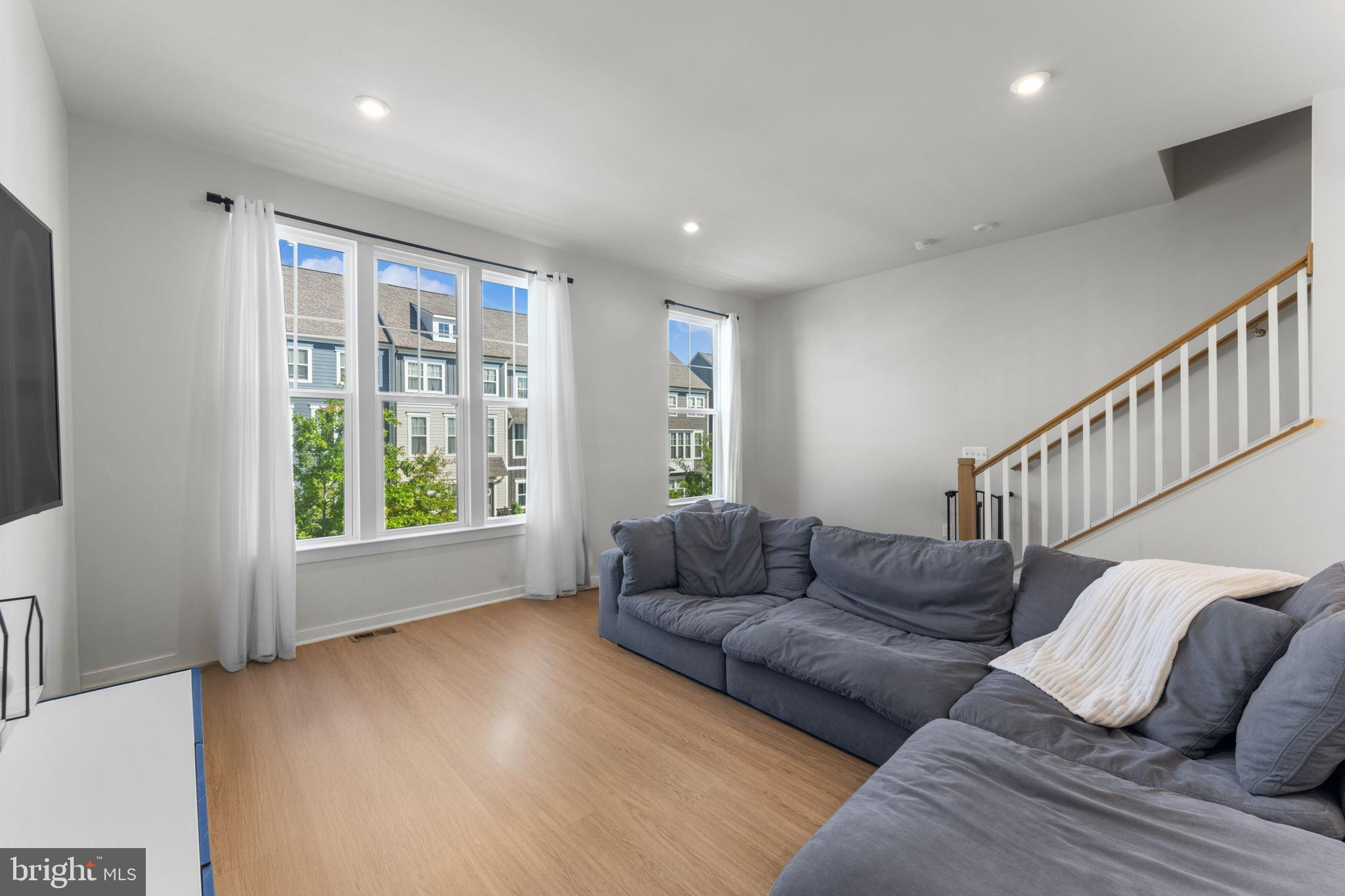 1783 Hickory Woods Road Dumfries, VA 22026 - Photo 14 of 54 a living room with furniture and a window