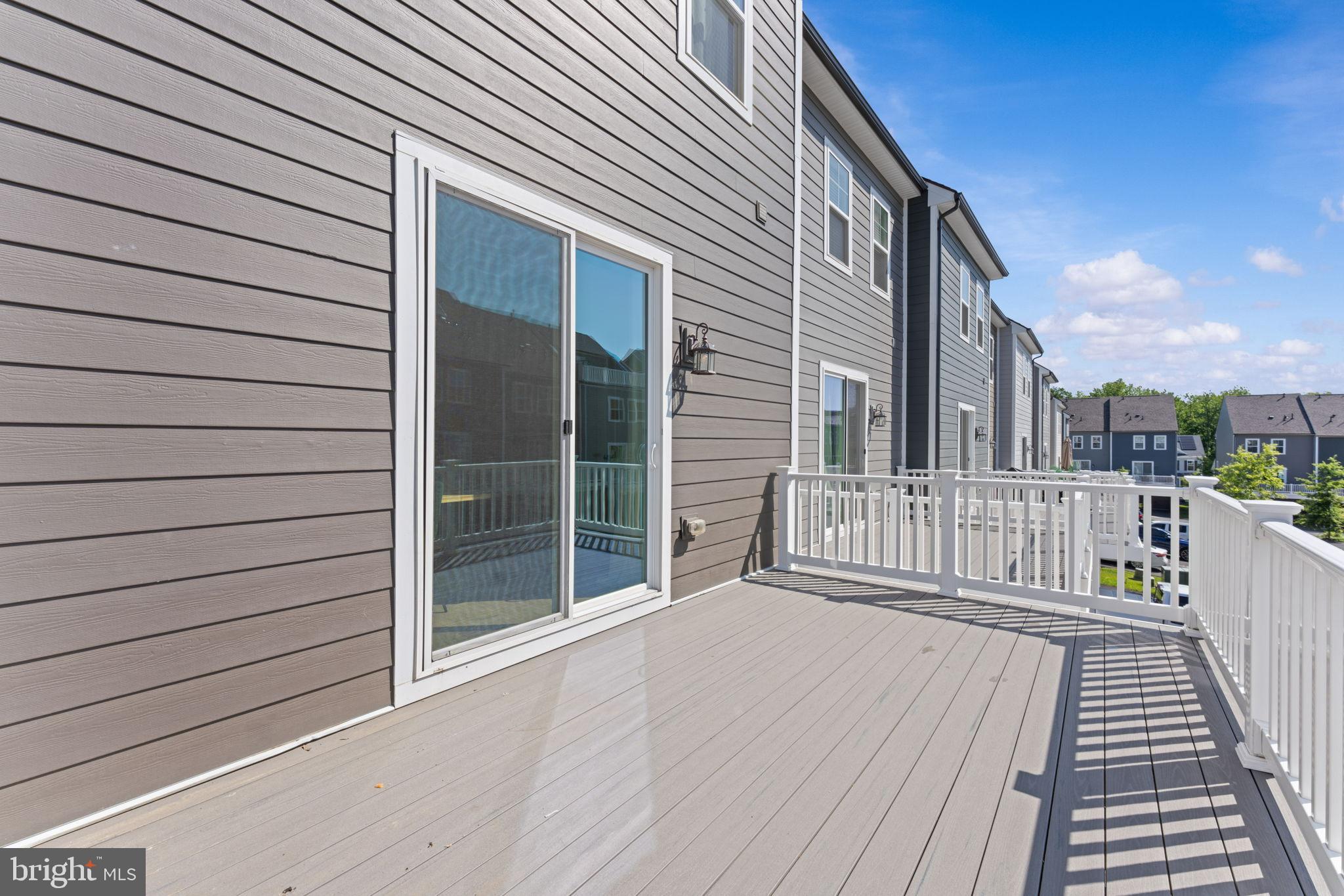 1783 Hickory Woods Road Dumfries, VA 22026 - Photo 18 of 54 a view of a wooden deck