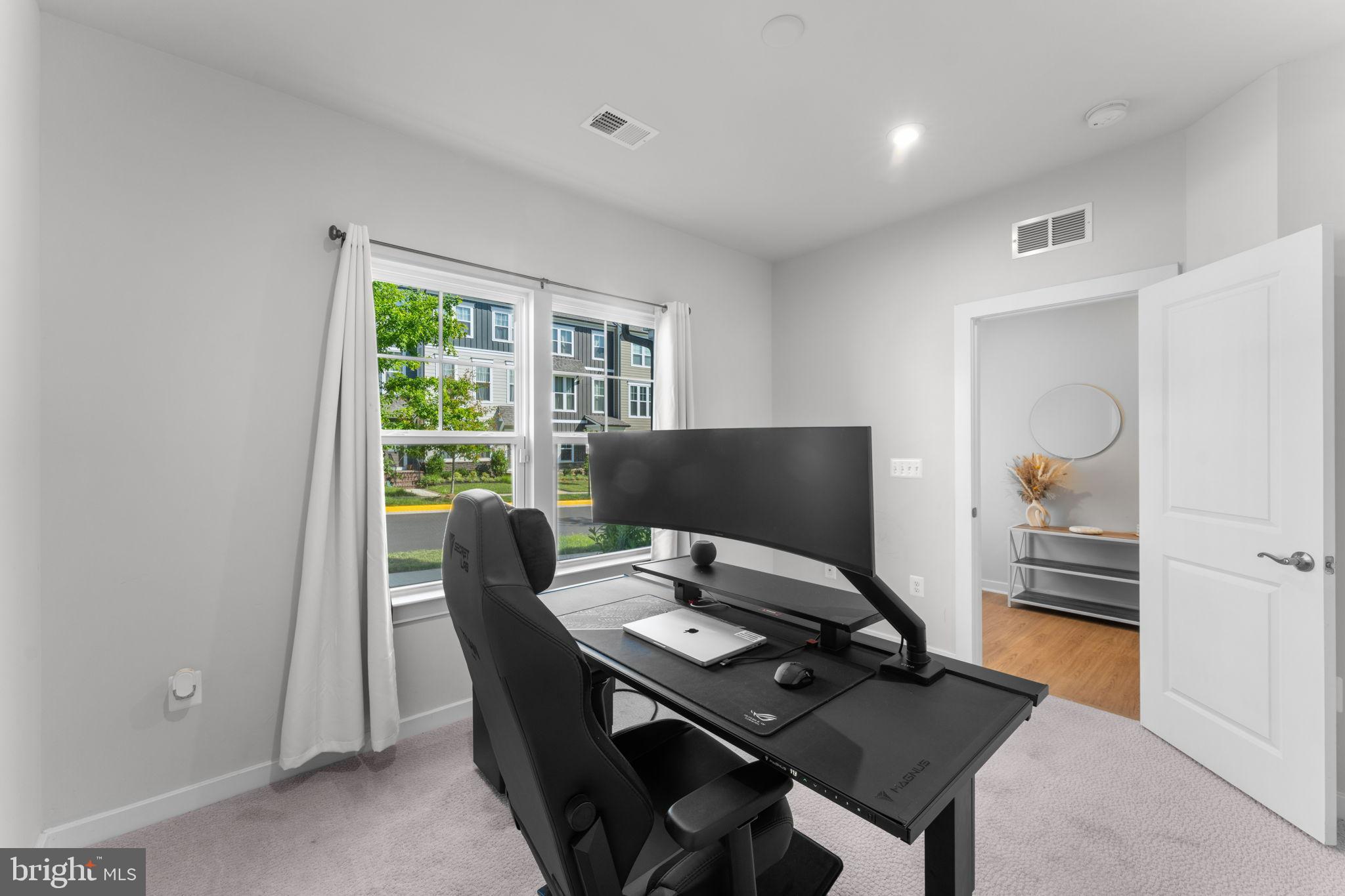 1783 Hickory Woods Road Dumfries, VA 22026 - Photo 21 of 54 a workspace with furniture and a window