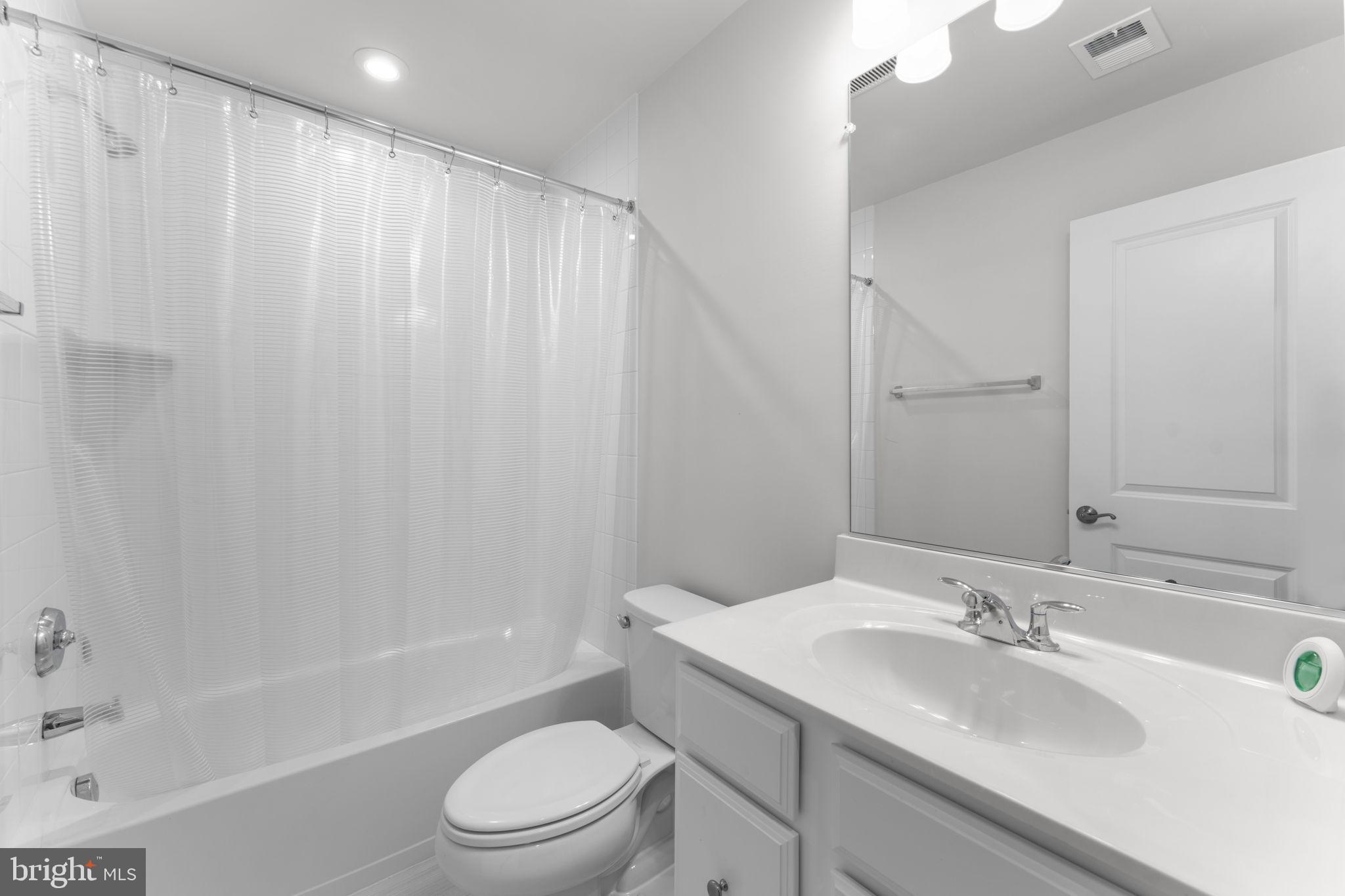 1783 Hickory Woods Road Dumfries, VA 22026 - Photo 27 of 54 a bathroom with a sink toilet and shower