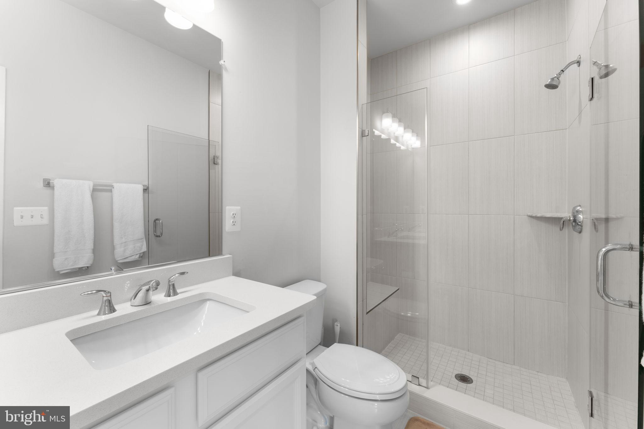 1783 Hickory Woods Road Dumfries, VA 22026 - Photo 28 of 54 a bathroom with a sink toilet and shower