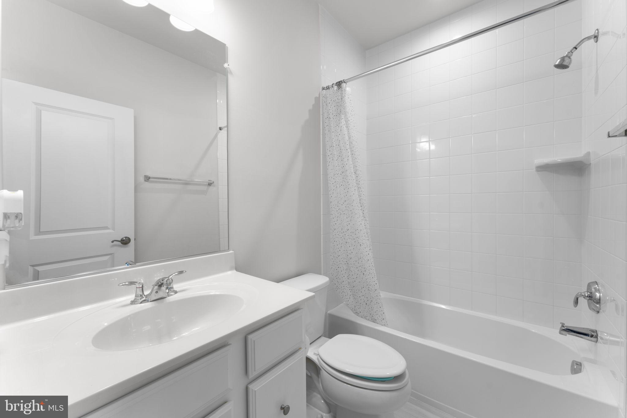 1783 Hickory Woods Road Dumfries, VA 22026 - Photo 29 of 54 a bathroom with a sink toilet and shower