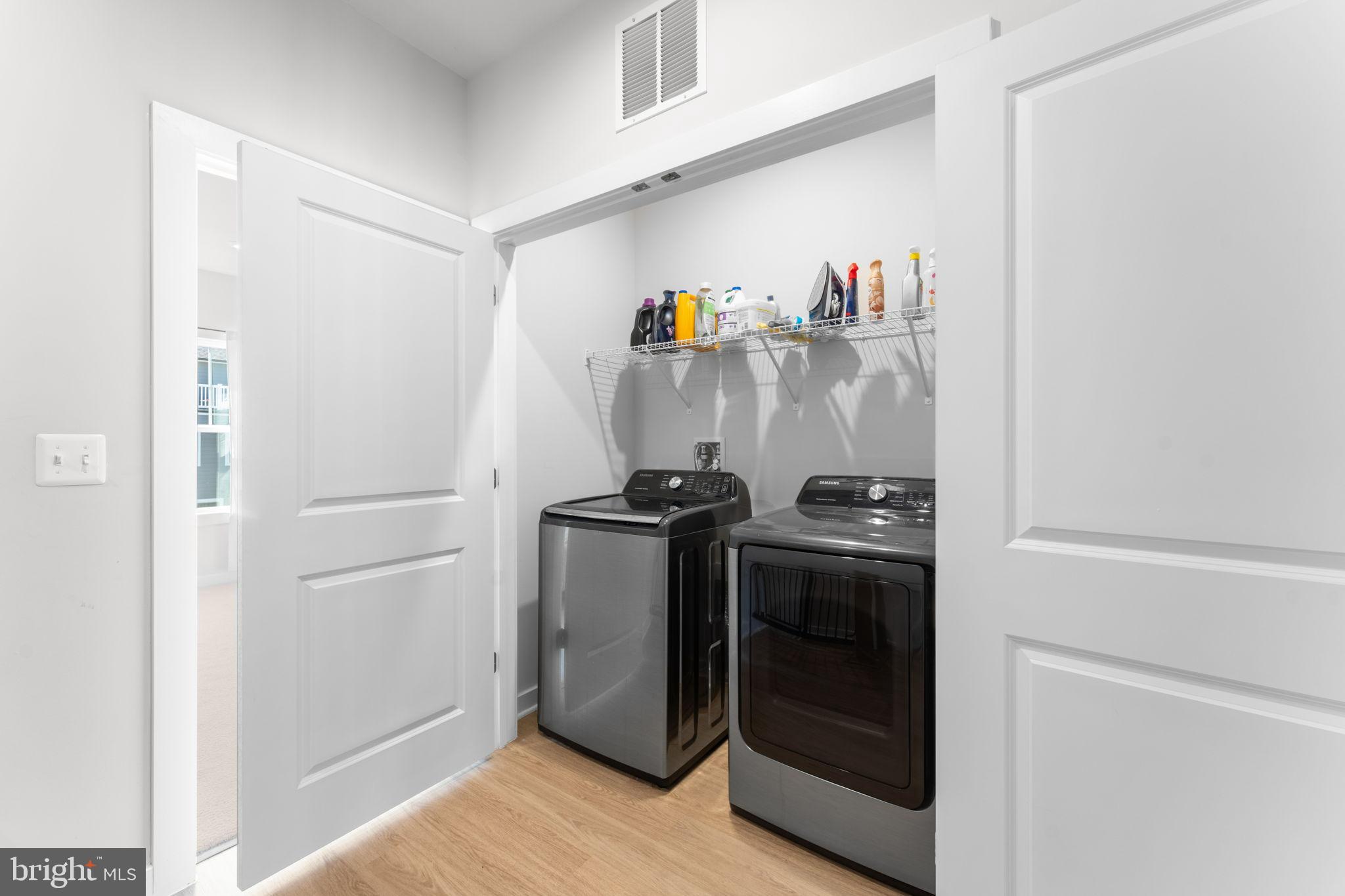 1783 Hickory Woods Road Dumfries, VA 22026 - Photo 34 of 54 a utility room with dryer and washer