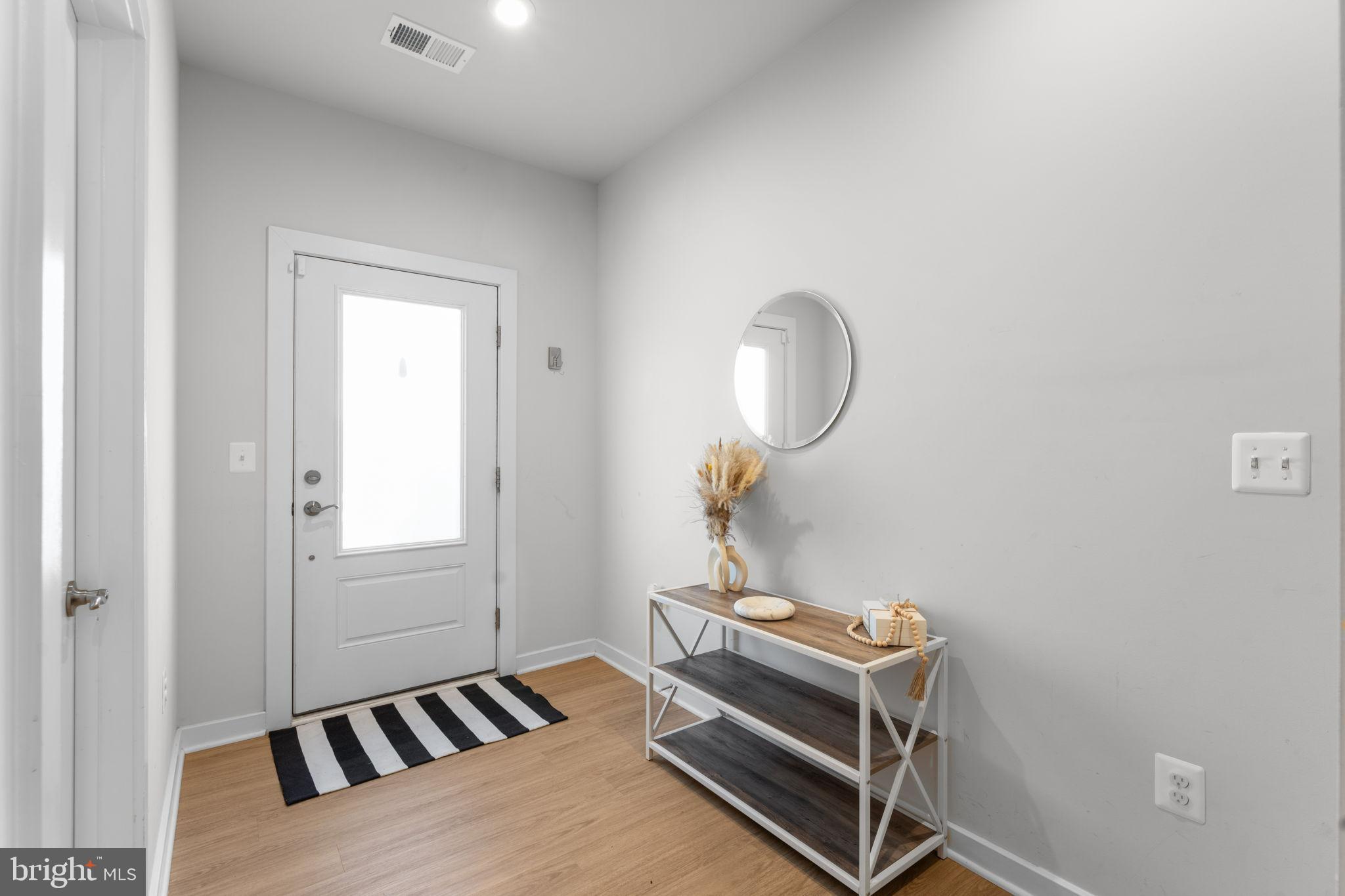 1783 Hickory Woods Road Dumfries, VA 22026 - Photo 4 of 54 Bright and inviting entryway with modern charm.