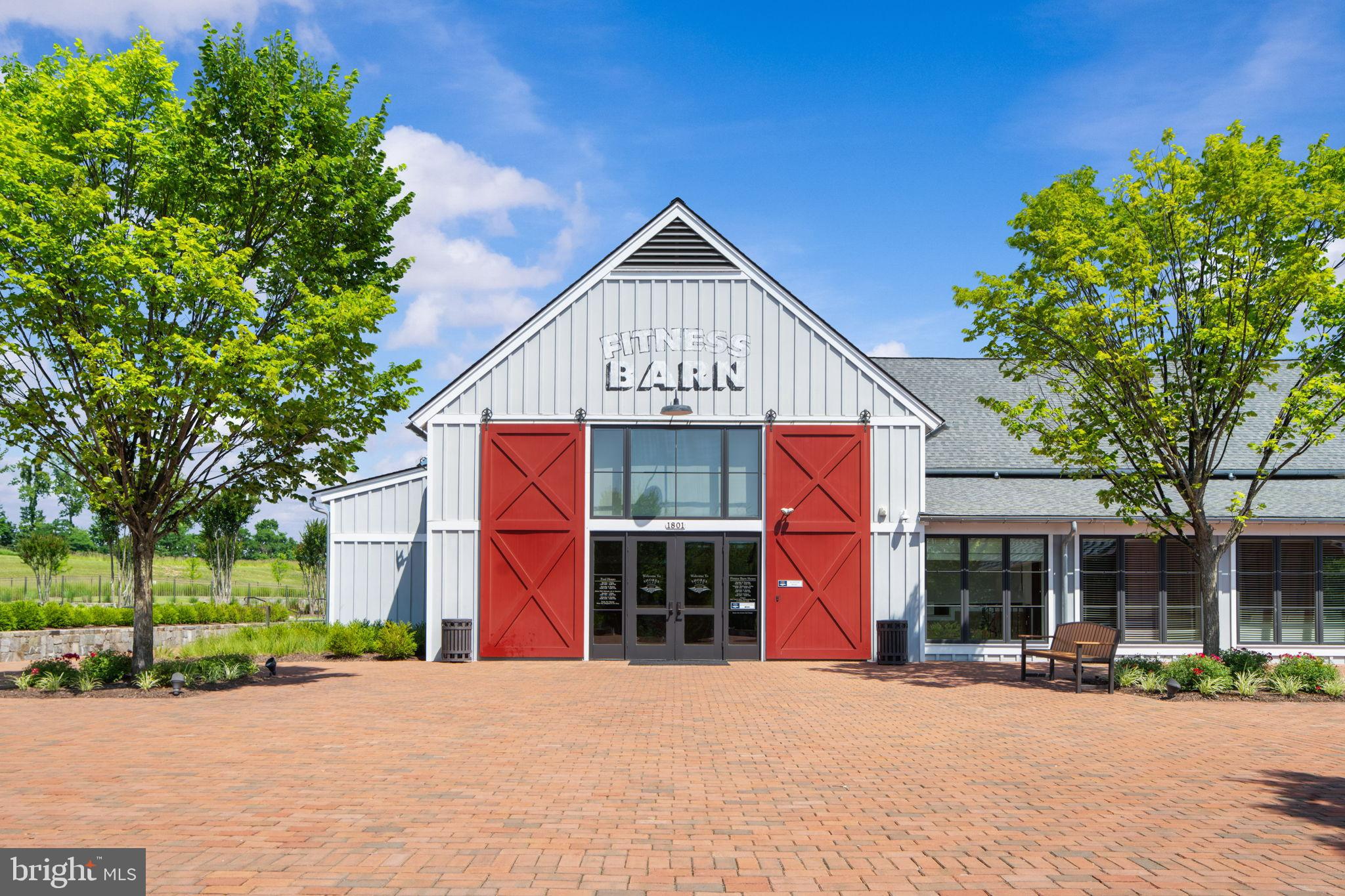 1783 Hickory Woods Road Dumfries, VA 22026 - Photo 41 of 54 a front view of a house with a yard