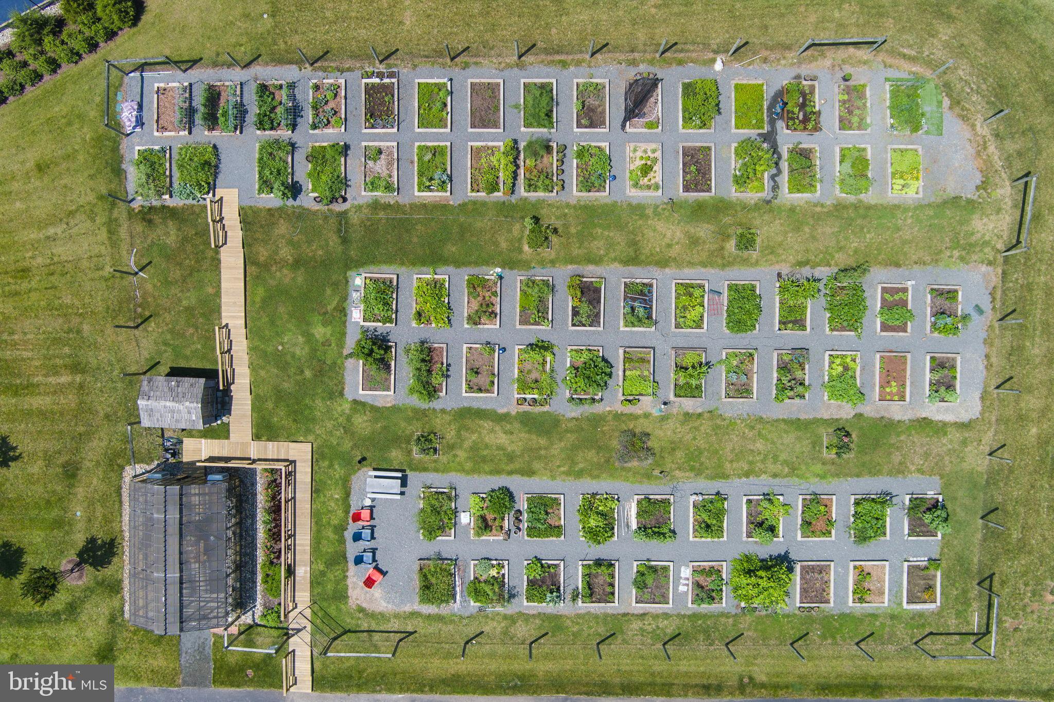 1783 Hickory Woods Road Dumfries, VA 22026 - Photo 46 of 54 a front view of a building with glass windows