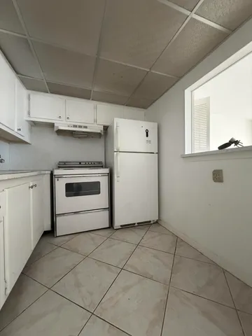 a utility room with washer and dryer