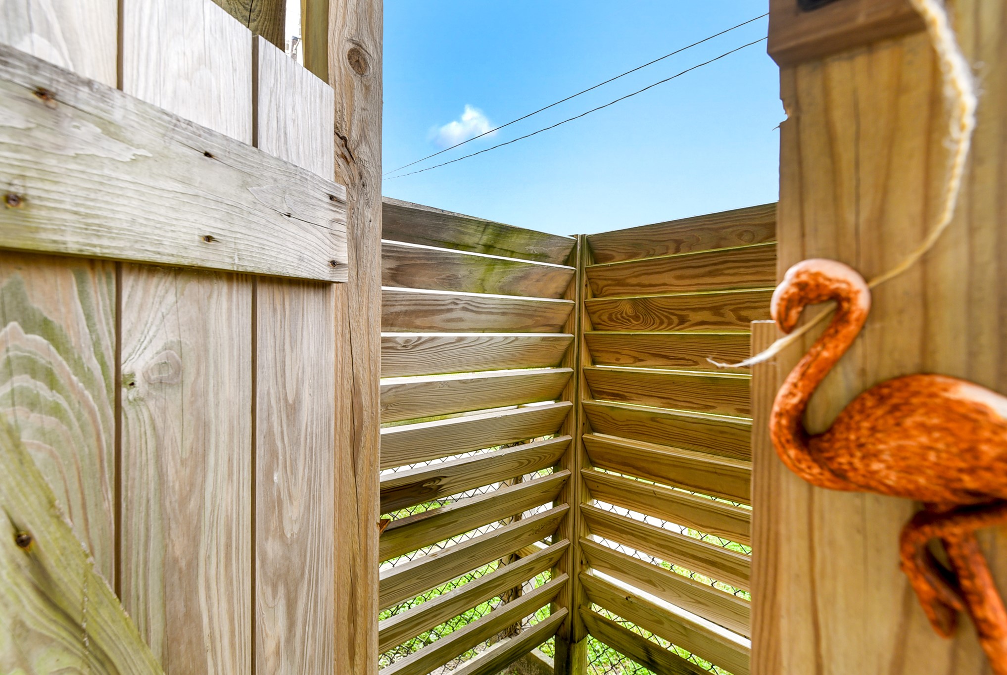 126 Nesmith Place Surfside Beach, TX 77541 - Photo 13 of 49 a view of door with wooden door