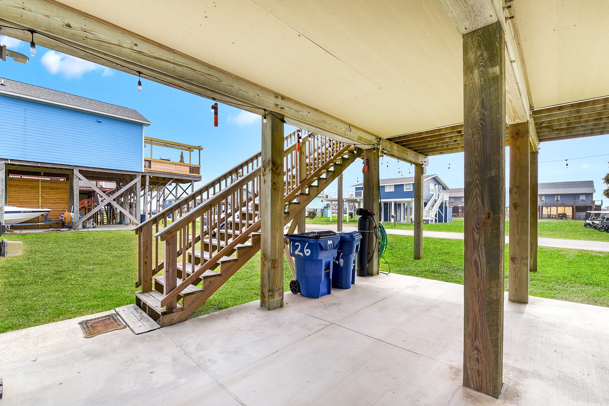 126 Nesmith Place Surfside Beach, TX 77541 - Photo 15 of 49 a view of an entryway with a tree