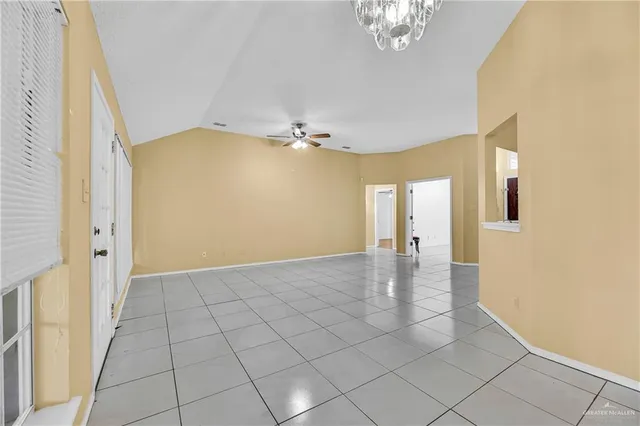 a view of a hallway with a chandelier