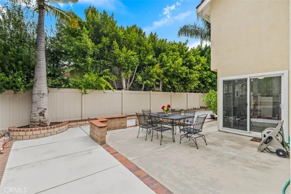an outdoor space with patio and furniture