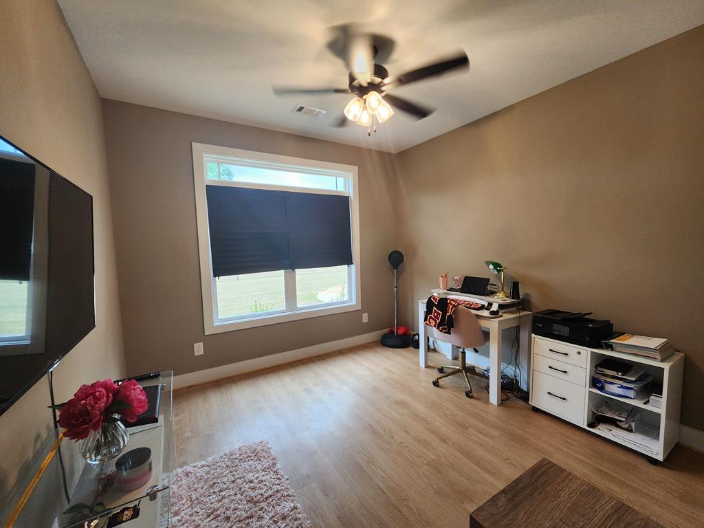 152 McLendon Road Fort Mitchell, AL 36856 - Photo 20 of 27 a workspace with furniture and a window