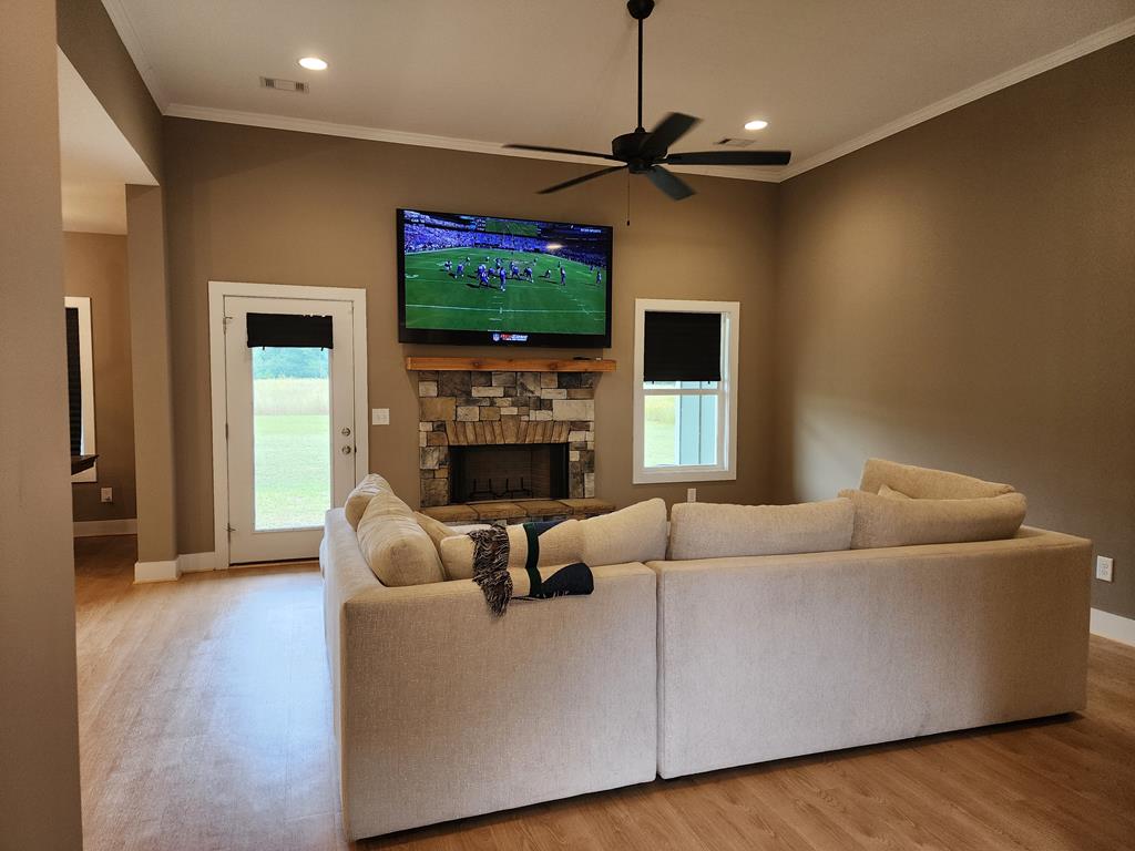 152 McLendon Road Fort Mitchell, AL 36856 - Photo 5 of 27 a living room with furniture and a flat screen tv